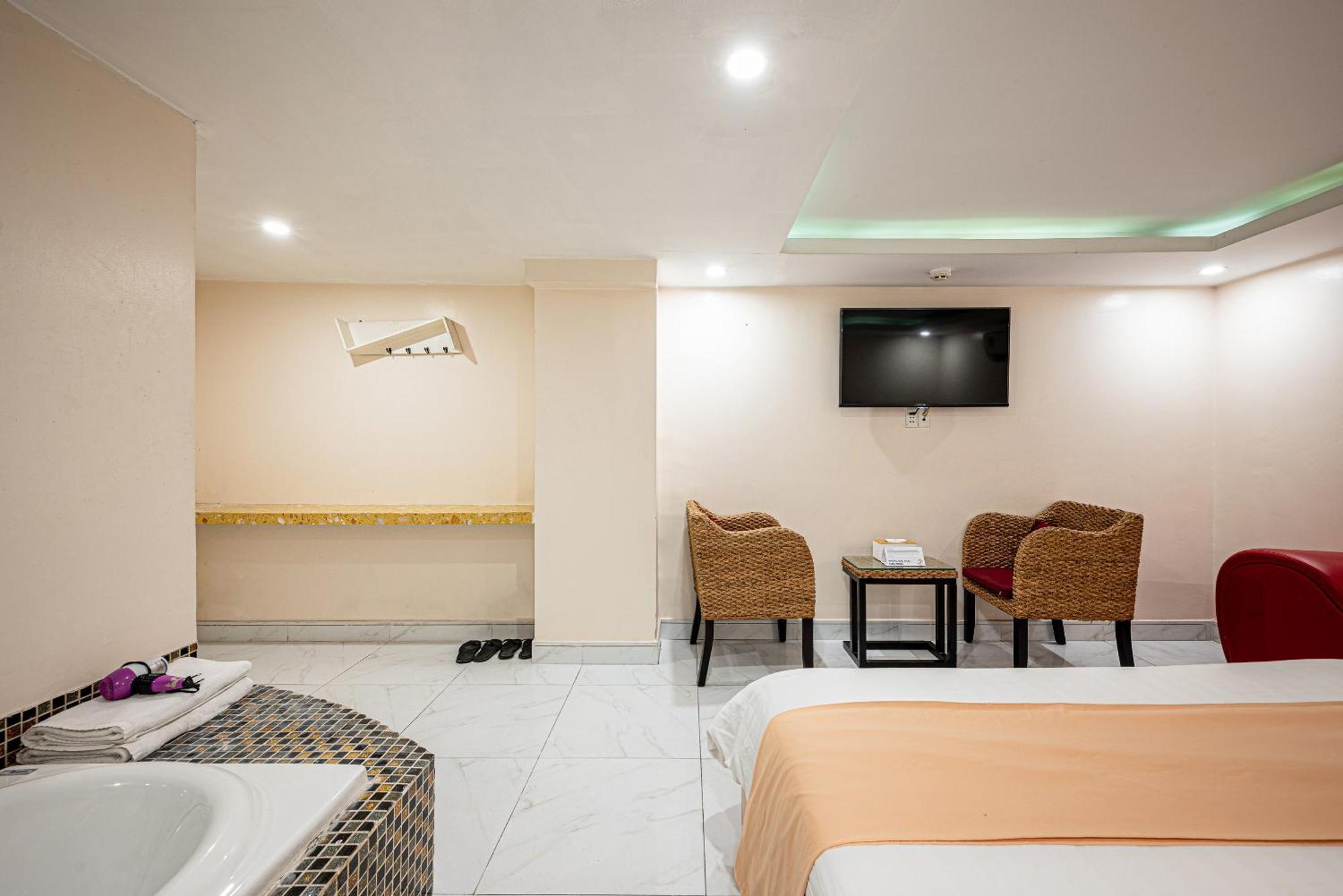 Joy In By Cozrum Hotel